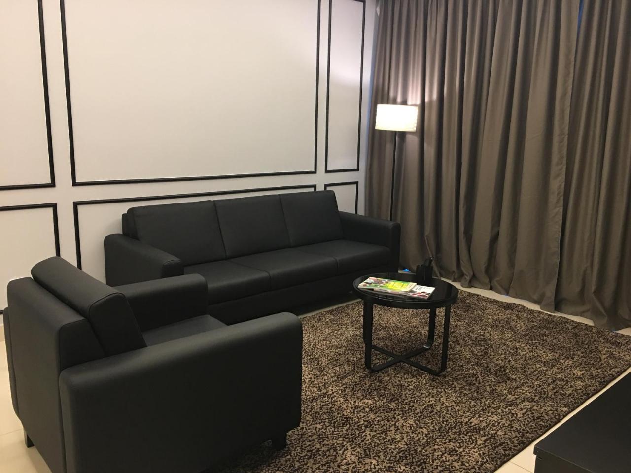 Gloria Residences Ion Delemen Genting Highlands Exterior foto A living room in a condominium
